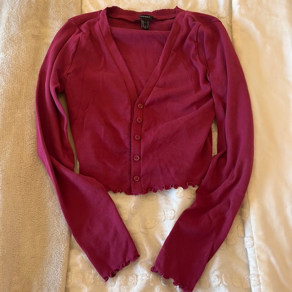 Forever 21 women’s maroon cropped ruffle sweater.